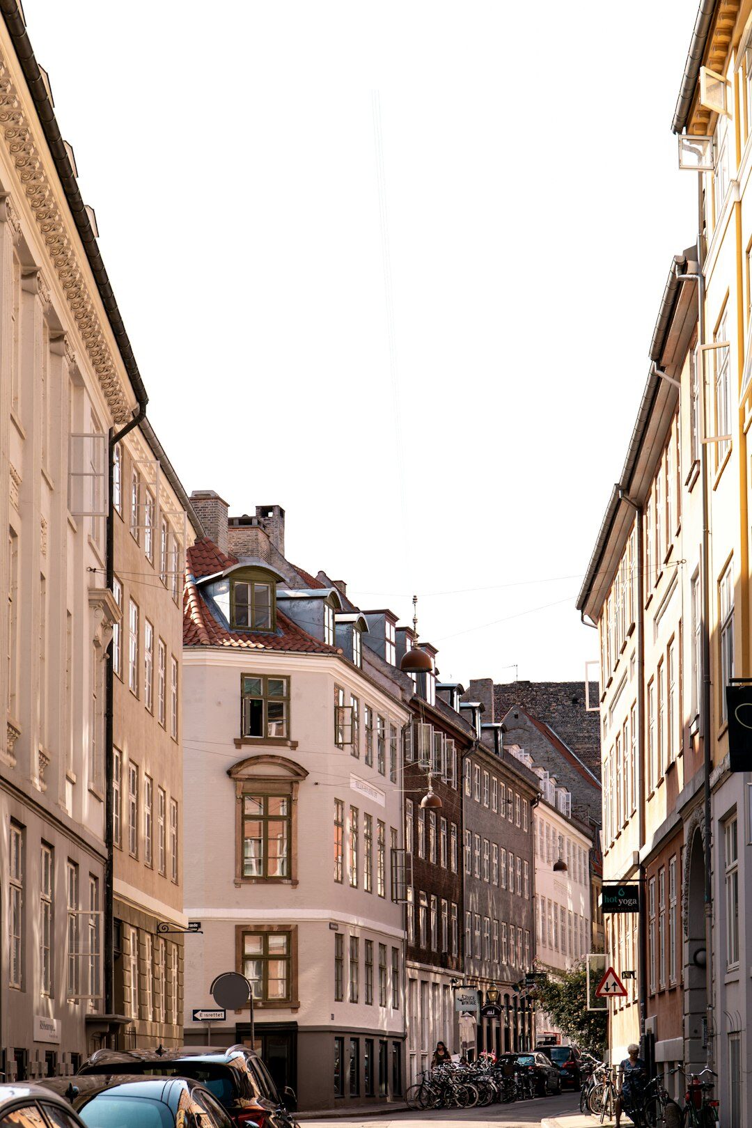Quiet residential street in a Danish town with bicycles